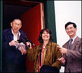 Weylin Eng, right, and Wilson Wong meet after 30 years by coincidence outside the Cathay Clubhouse on Commercial Street in San Francisco's Chinatown.